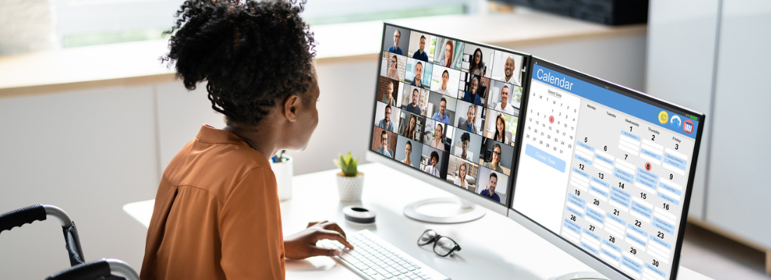 Woman works virtually with large cross-cultural team via video conference