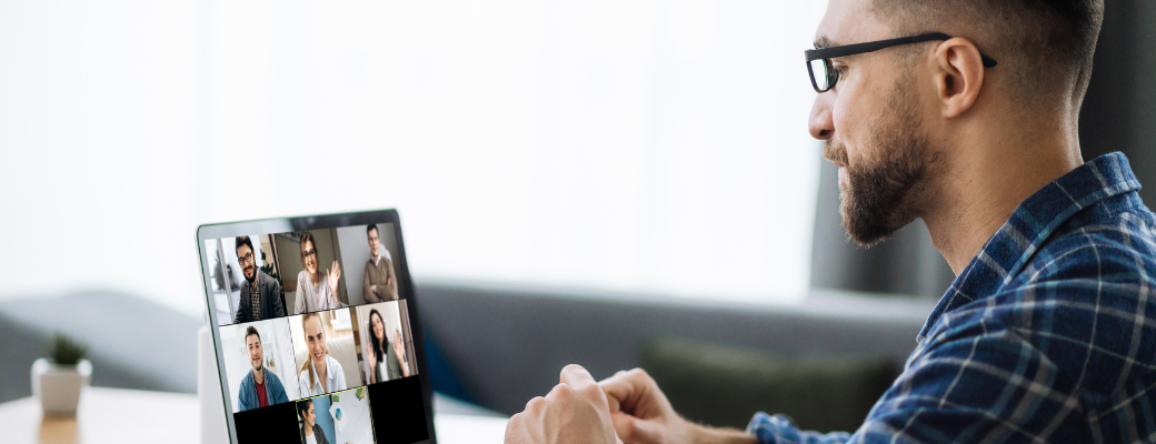 man in virtual conference with colleagues