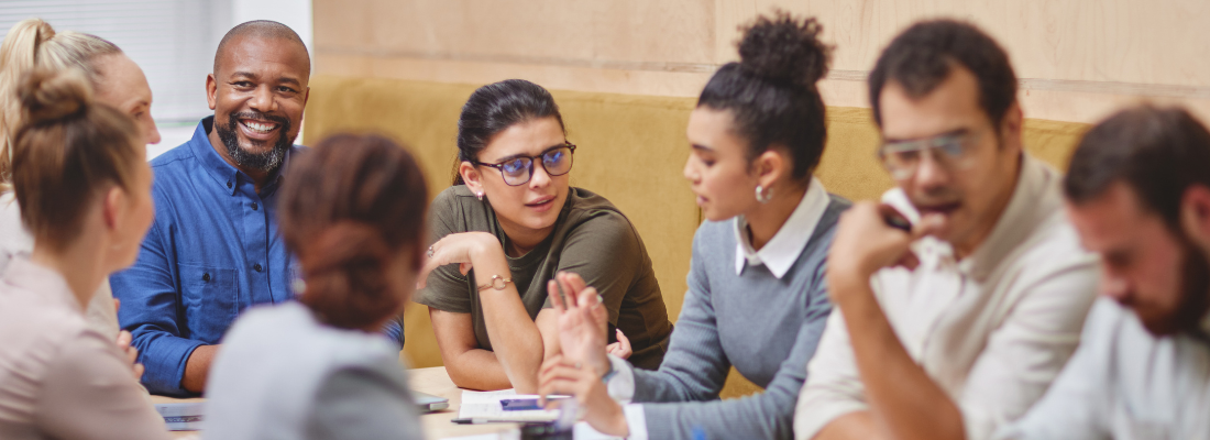 diverse professionals conversing in a business setting
